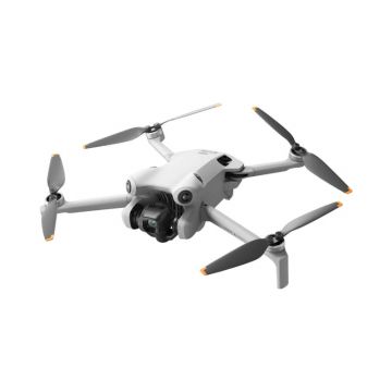 DJI Mini 4 Pro drone in flight.
