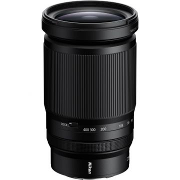 Close-up view of the NIKKOR Z 28-400mm f/4-8 VR lens, showcasing its zoom ring and focus control.
